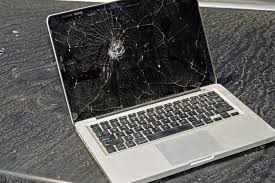 Silver iPhone with cracked screen